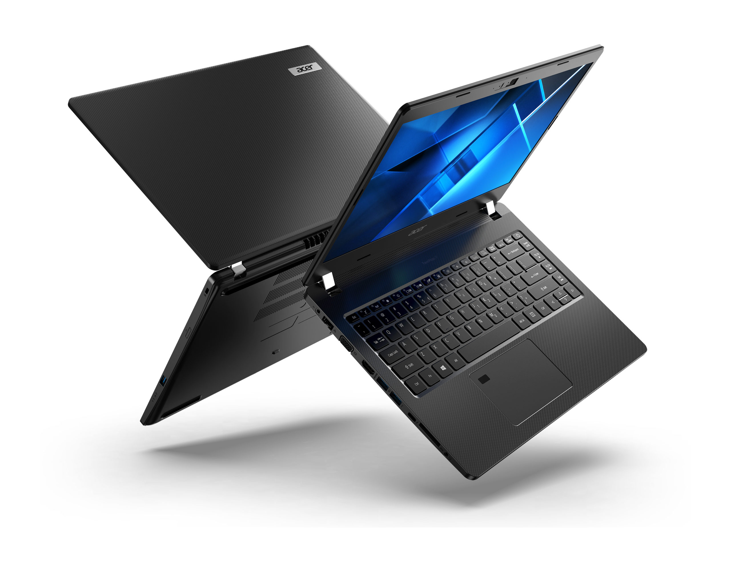 Acer TravelMate P2 open against another one, back to back Acer TravelMate P2 open against another one, back to back